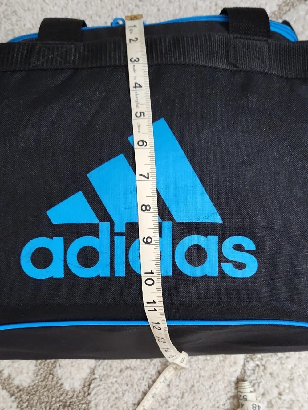 Adidas Black Duffel Bag with Bright Blue Accents